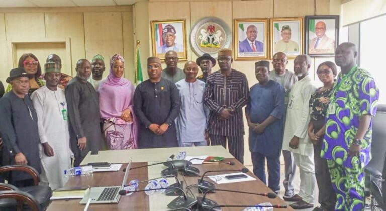 Group photo in an official meeting.